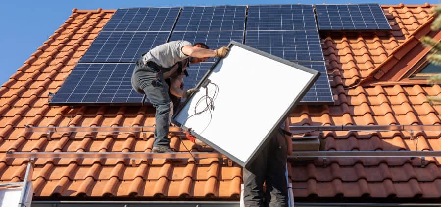 Solar Panels being Installed on a roof